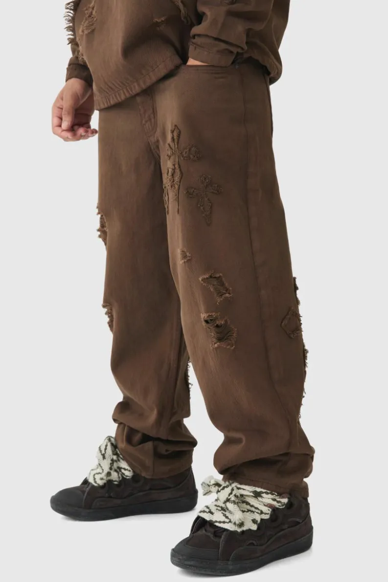 Best boohooMAN Baggy Fit Cross Applique Dirty Wash Jeans brown