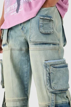 Store boohooMAN Baggy Rigid Multi Pocket Cargo Strap Denim Jean In light blue