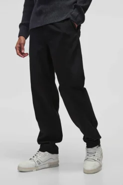 Online boohooMAN Baggy Tapered Chinos In black