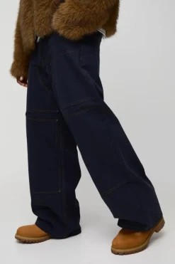 Shop boohooMAN Baggy Twill Contrast Stitch Carpenter Trousers ink