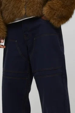 Shop boohooMAN Baggy Twill Contrast Stitch Carpenter Trousers ink