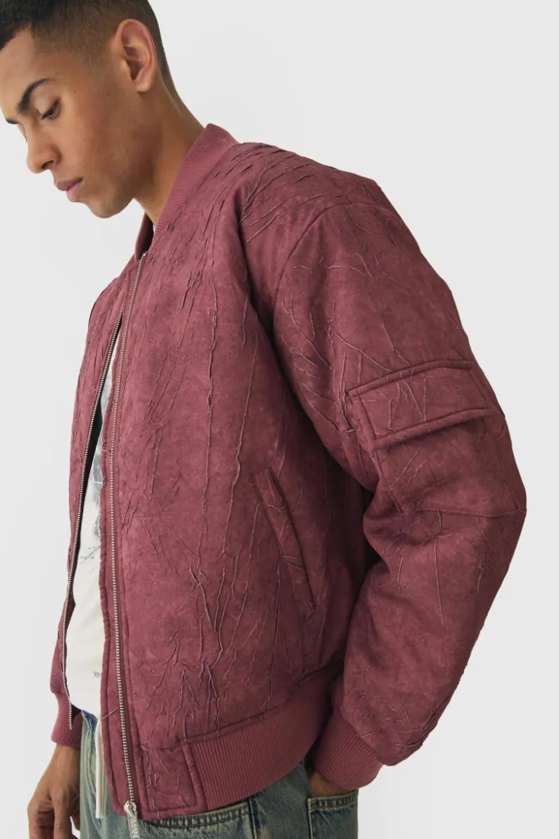 Store boohooMAN Boxy Crinkle Washed Padded Bomber Jacket In red