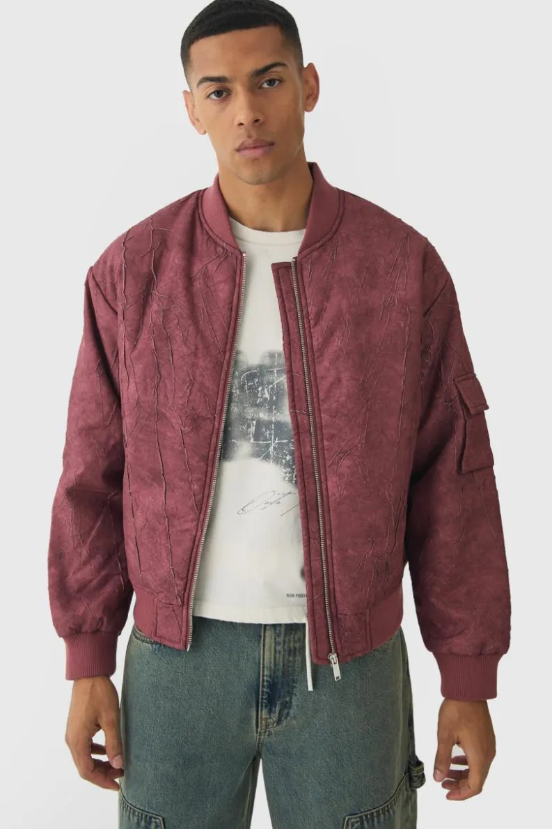 Store boohooMAN Boxy Crinkle Washed Padded Bomber Jacket In red