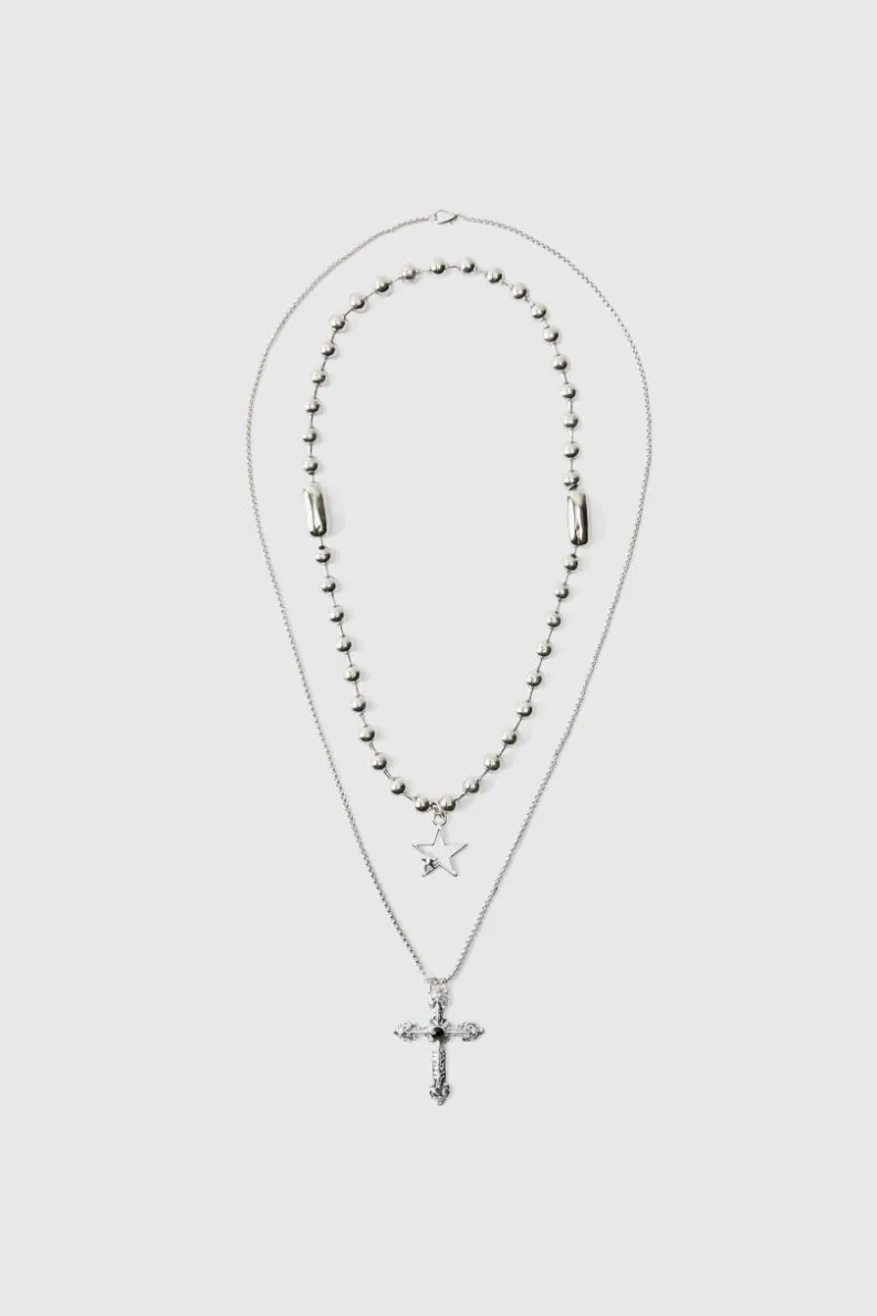 Shop boohooMAN Cross Pendant Double Layered Necklace In silver