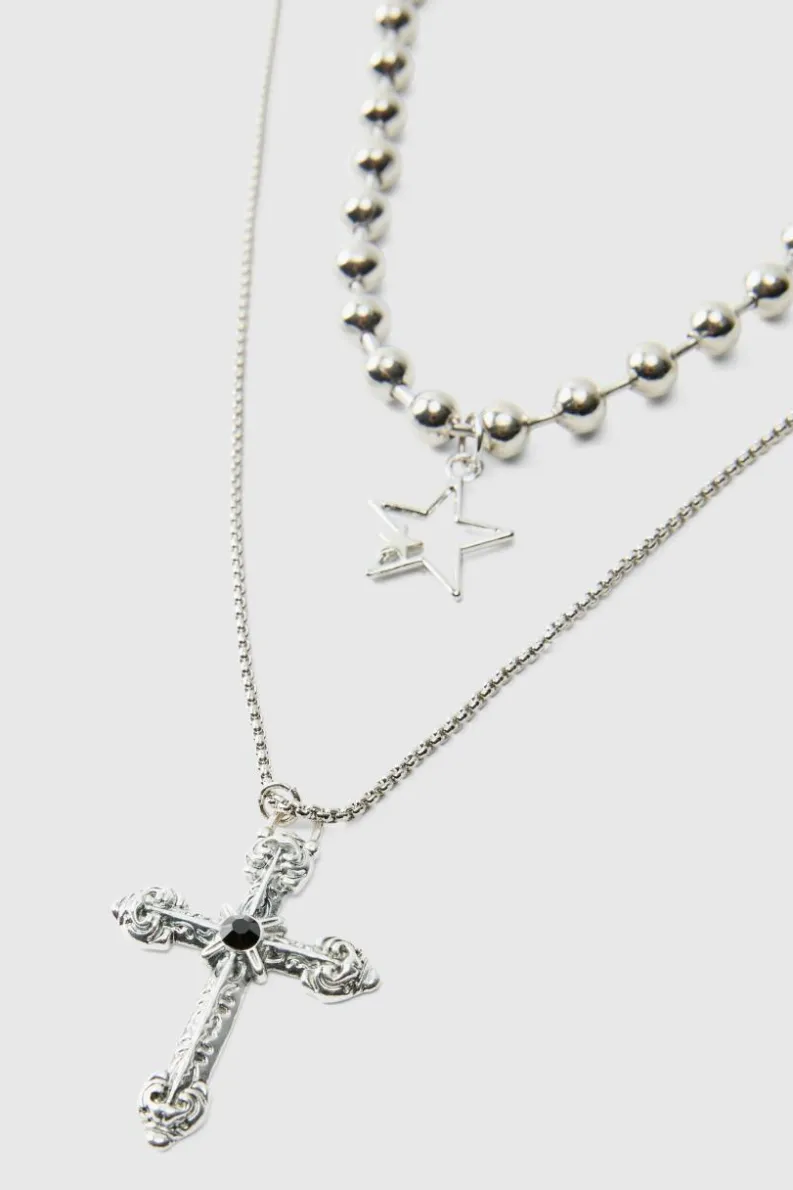 Shop boohooMAN Cross Pendant Double Layered Necklace In silver