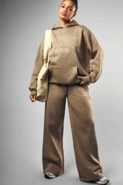 Shop boohoo Dsgn Collegiate Embroidered Oversized Hoodie khaki
