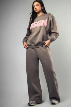 Shop boohoo DSGN Towelling Applique Tracksuit grey