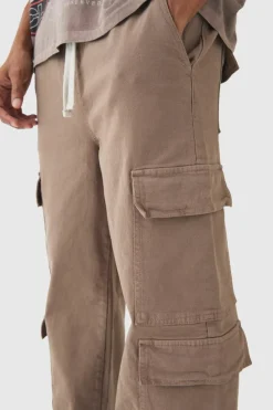 Online boohooMAN Elasticated Baggy Fit Multi Cargo Trousers taupe