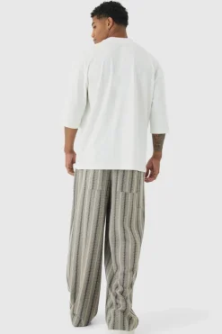 Store boohooMAN Elasticated Waist Baggy Boucle Trousers black