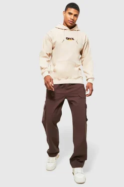 Shop boohooMAN Elasticated Waist Relaxed Fit Buckle Cargo Trouser chocolate