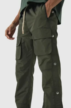 Shop boohooMAN Elasticated Waist Slim Flare Stacked Cargo Trousers khaki
