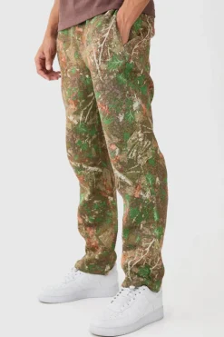 Shop boohooMAN Elasticated Waist Straight Leg Camo Tapestry Trouser khaki