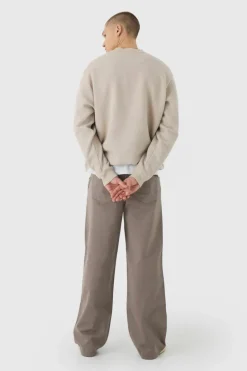 Shop boohooMAN Elasticated Waist Wide Leg Pintuck Chino Trousers taupe