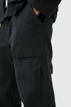 New boohooMAN Elasticated Waist Zip Hem Flared Cargo Trousers black