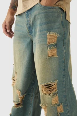 Fashion boohooMAN Extreme Baggy Rigid All Over Ripped Jeans light blue