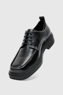 Store boohooMAN Faux Leather Contrast Stitch Derby Shoes In black