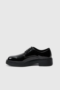Shop boohooMAN Faux Leather Derby Shoes In black