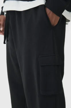 Sale boohooMAN 330GSM Plus Oversized Cargo Jogger In black