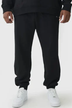 Online boohooMAN 330GSM Plus Regular Fit Man Signature Jogger In black
