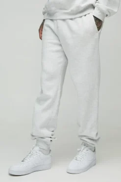 Shop boohooMAN 330GSM Tall Regular Fit Man Signature Jogger In grey marl