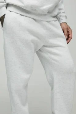 Shop boohooMAN 330GSM Tall Regular Fit Man Signature Jogger In grey marl