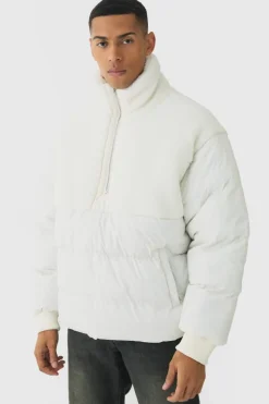 Store boohooMAN Half Zip Borg And Nylon Funnel Neck Puffer Jacket In ecru