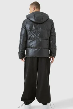 Shop boohooMAN Hooded High Shine Puffer Jacket in black
