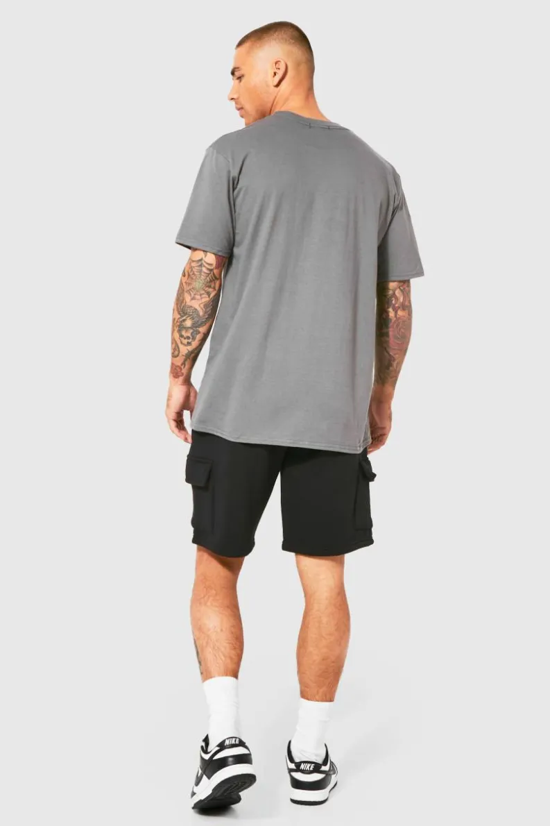 Store boohooMAN Loose Fit Cargo Jersey Short black
