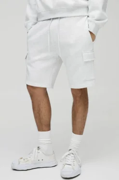 Shop boohooMAN Loose Fit Mid Length Cargo Shorts grey marl