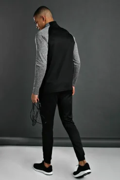 Shop boohooMAN Man Active Gym Funnel Neck Tracksuit black