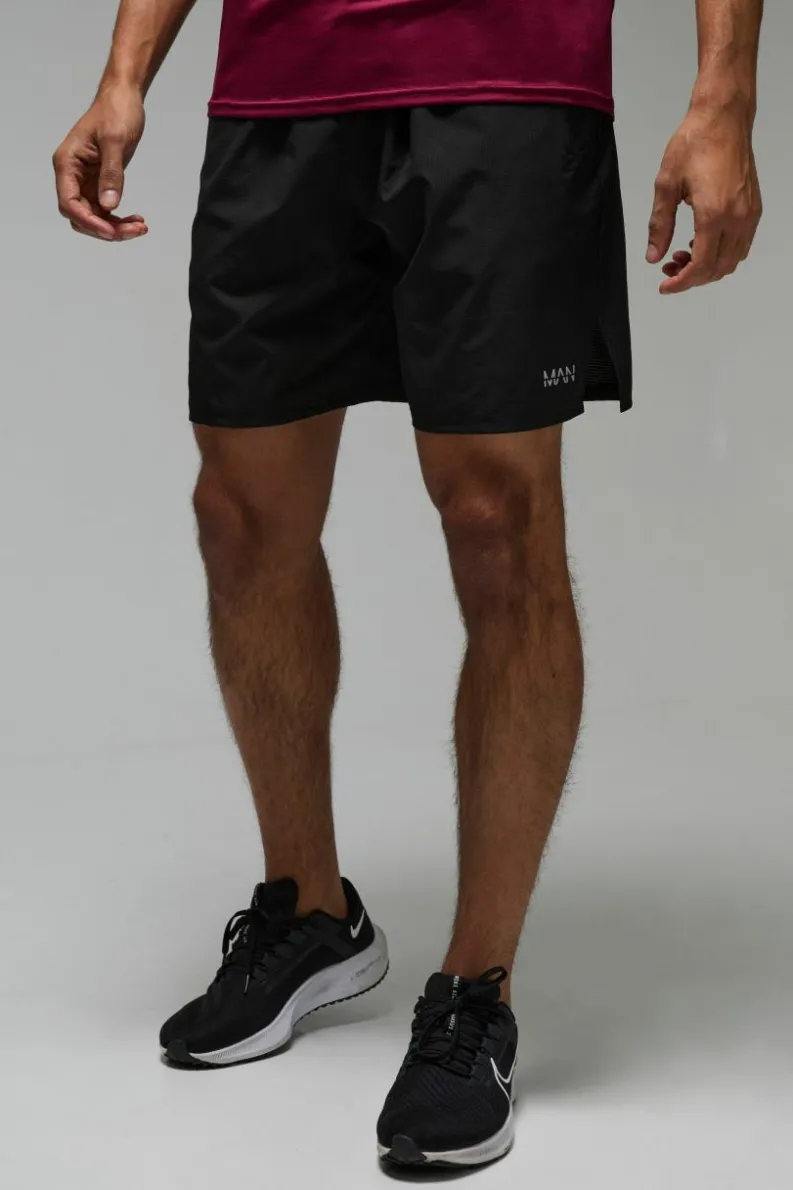 Discount boohooMAN Man Active 7inch Perforated Grid Short black
