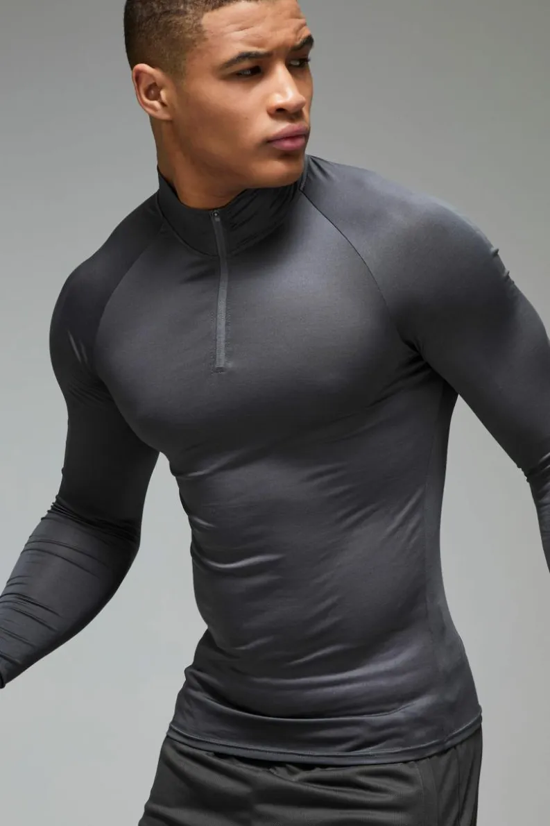 Shop boohooMAN Man Active Lightweight Essentials Gym Raglan Muscle Fit 1/4 Zip charcoal