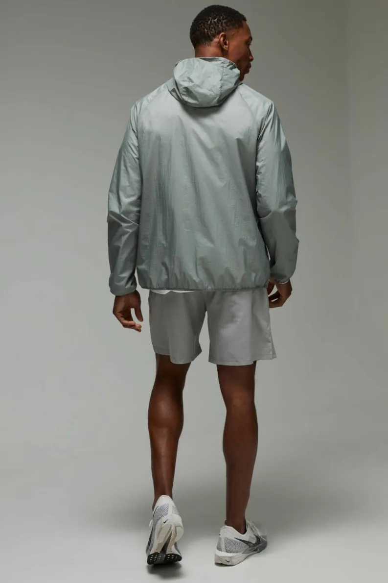 Shop boohooMAN Man Active Lightweight Shower Resistant Windbreaker charcoal