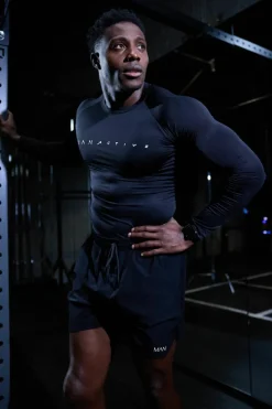 Store boohooMAN Man Active Muscle Fit Breathable Lightweight Long Sleeve T-shirt black