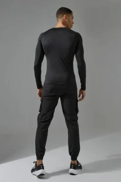 Store boohooMAN Man Active Muscle Fit Breathable Lightweight Long Sleeve T-shirt black