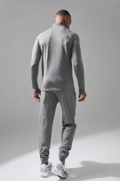 Best Sale boohooMAN Man Active Quarter Zip and Jogger Tracksuit charcoal