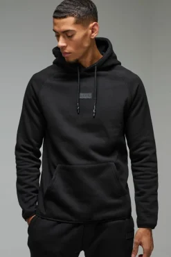 Shop boohooMAN Man Active Regular Fit Badge Hoodie black