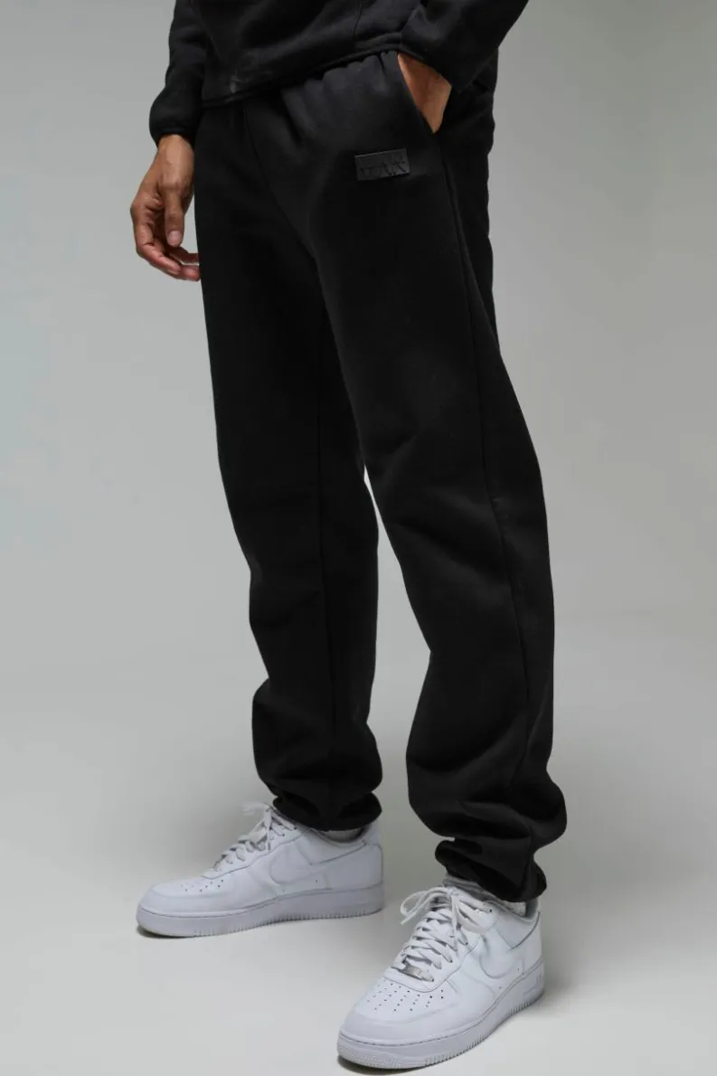 Discount boohooMAN Man Active Regular Fit Badge Jogger black