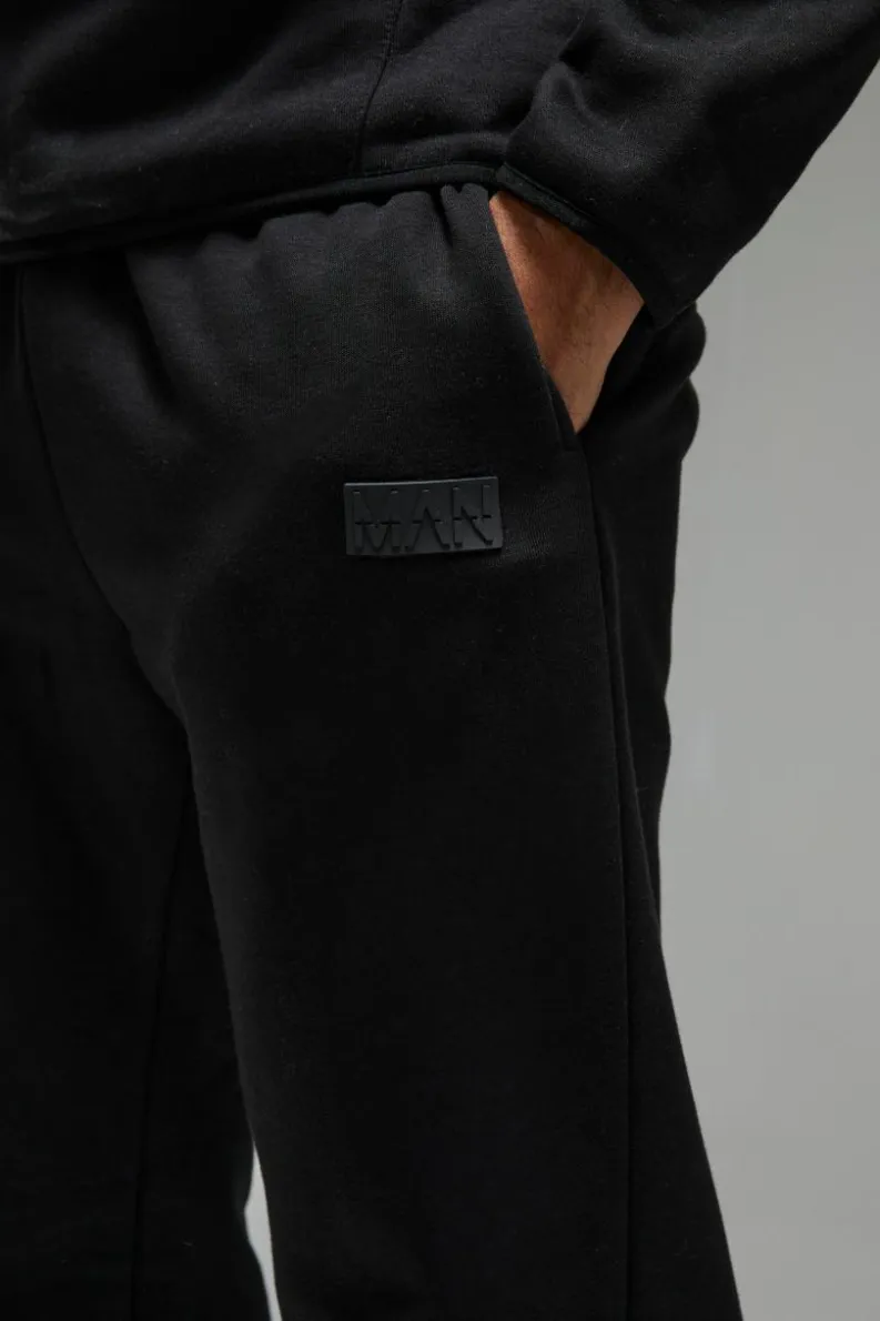 Discount boohooMAN Man Active Regular Fit Badge Jogger black