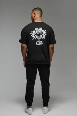 Shop boohooMAN Man Active Training Club Oversized T-shirt black