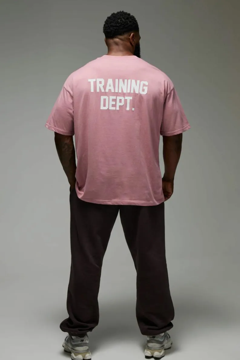Shop boohooMAN Man Active Training Dept. Oversized T-shirt pink