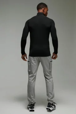 Discount boohooMAN Man Active Waffle Texture Muscle Fit 1/4 Zip black