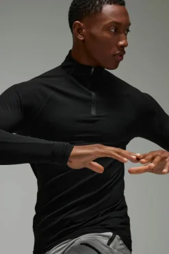 Discount boohooMAN Man Active Waffle Texture Muscle Fit 1/4 Zip black