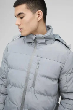 Shop boohooMAN Mid Length Hooded Puffer In grey