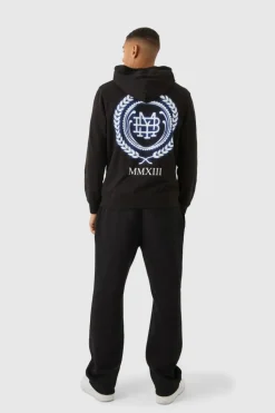 Shop boohooMAN MMXIII Crest Graphic Zip Through Hoodie black