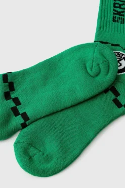 Shop boohooMAN Moto Racing Flag Socks green