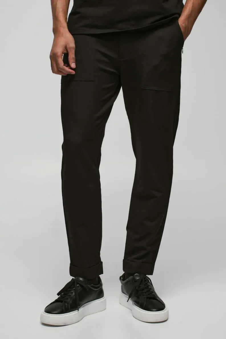 Shop boohooMAN Nylon Technical Stretch Slim Trouser black