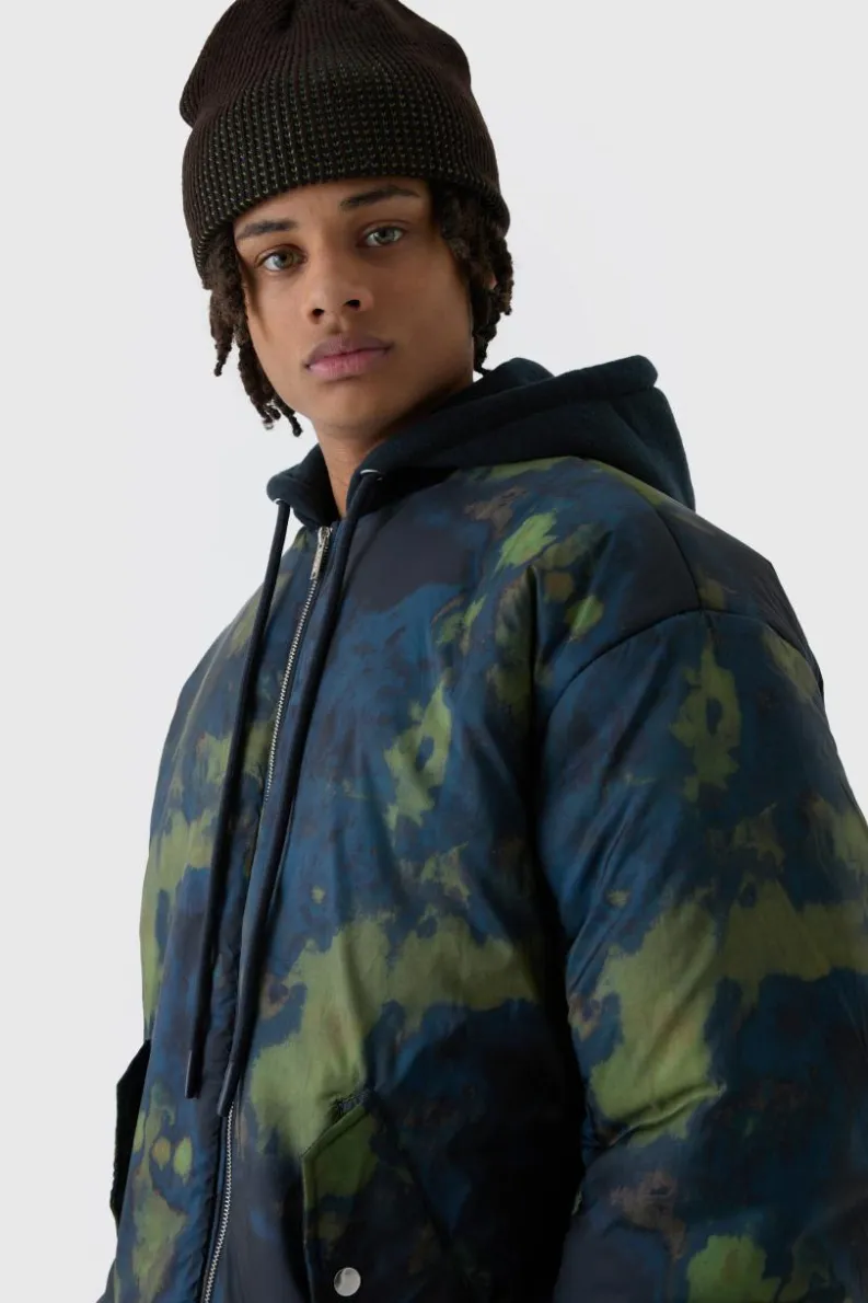 Online boohooMAN Oversized Abstract Print Hooded Bomber Jacket In navy