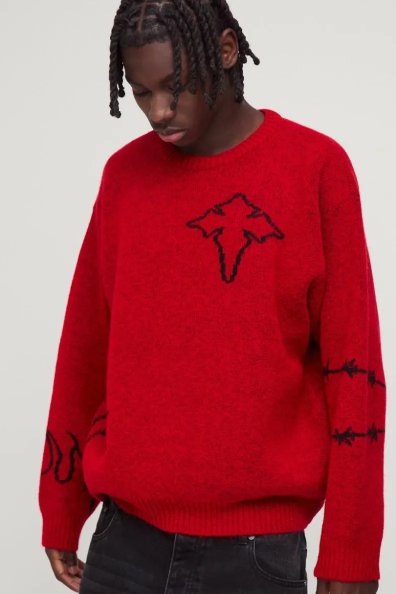 Shop boohooMAN Oversized Boxy Brushed Multi Doodle Graphic Knitted Jumper red