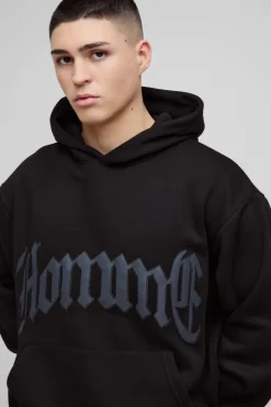 Shop boohooMAN Oversized Boxy Homme PU Applique Hoodie black